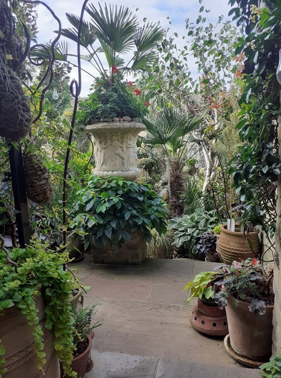 Garden with large urn feature