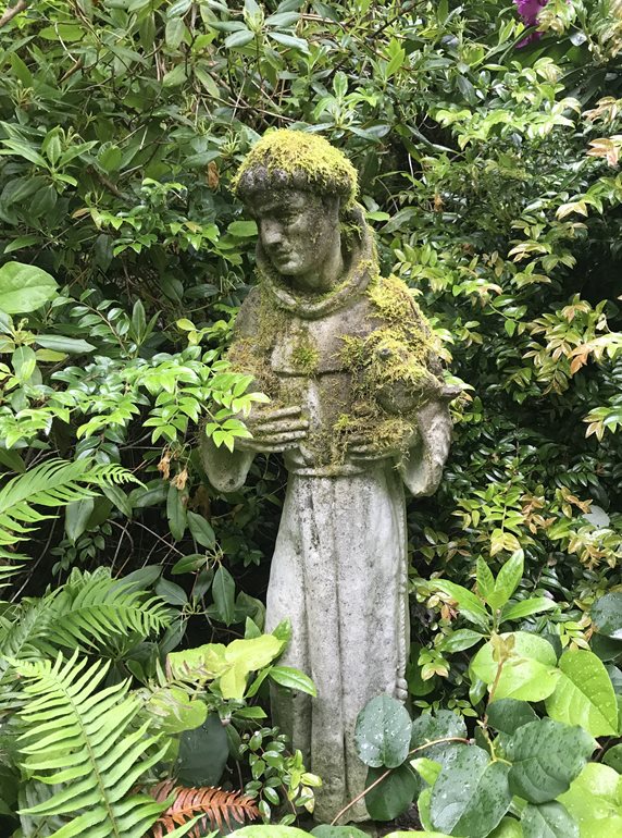 Friar statue in garden